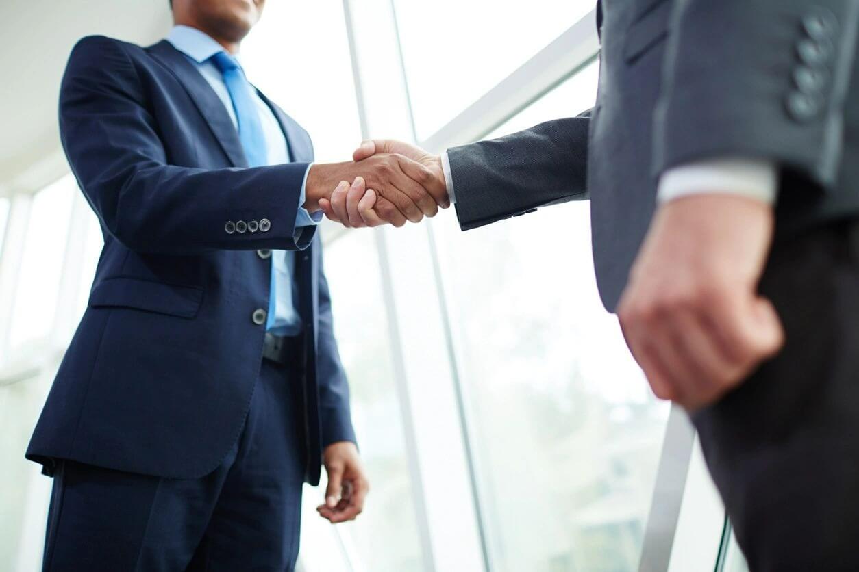 Businessman shake hands agree deal